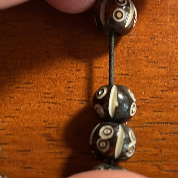 Bracelet warm brown wooden 
beaded bracelet with elephant decals elastic band - Picture 5 of 5